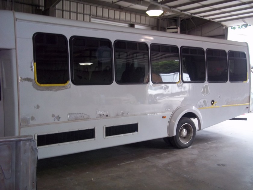 Before collision repairs on 2003 Ford E450 bus.